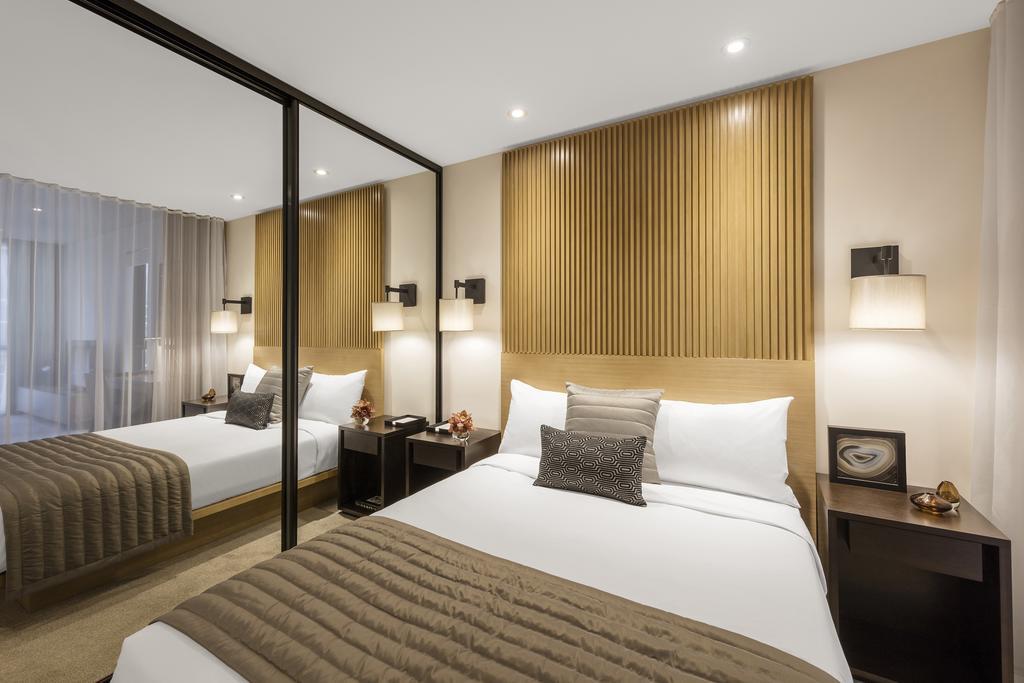 Skye Hotel Suites Parramatta Exterior foto A bedroom at the hotel
