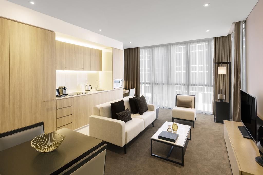Skye Hotel Suites Parramatta Exterior foto Interior of a serviced apartment in London